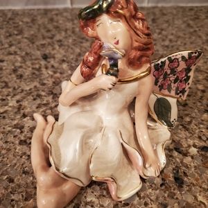 Blue sky sitting fairy by Heather Goldminc 2002